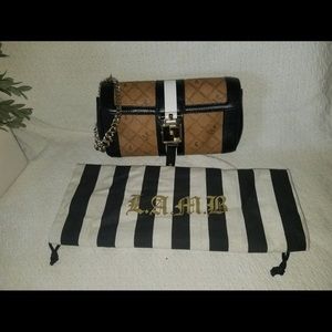 Lamb Brand (Gwen Stefani) wristlet